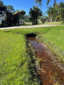 Roadside ditch crew continued drainage maintenance
