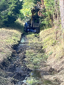 Roadside ditch crew continued drainage maintenance