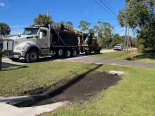 Crew from Road & Bridge working along Old Mission Road in New Smyrna Beach
